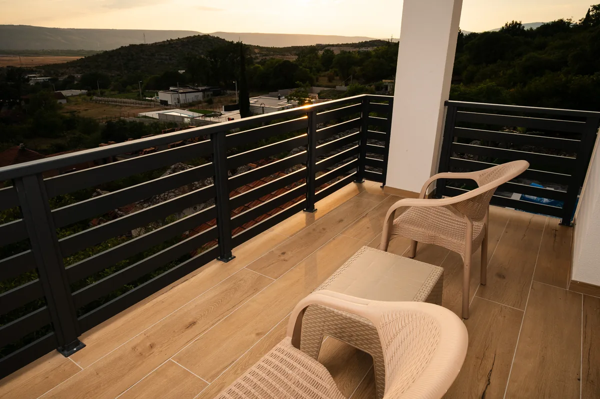 Upper balcony with mountain view at sunset