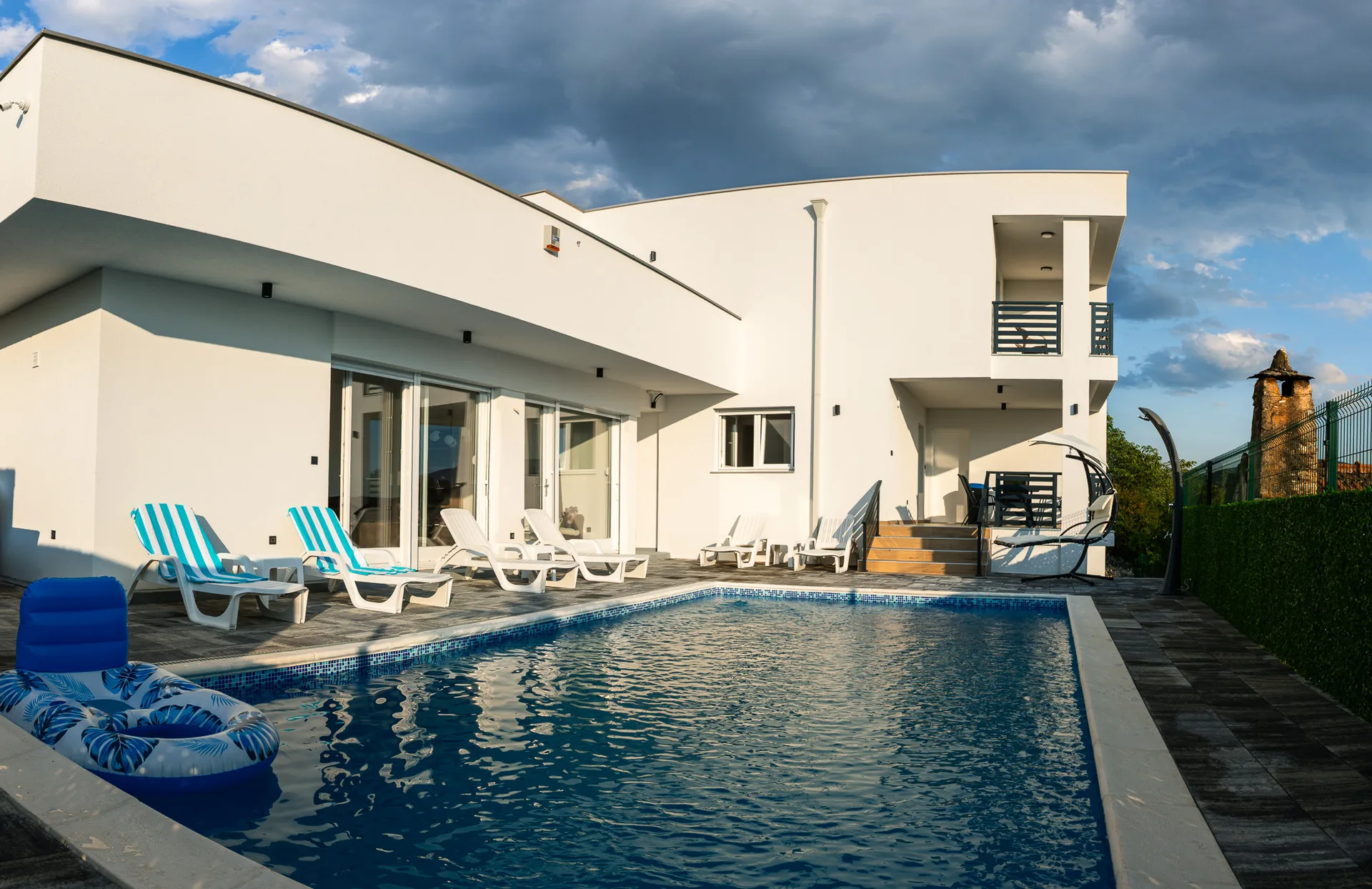 Villa Grande Lux pool and architecture at golden hour